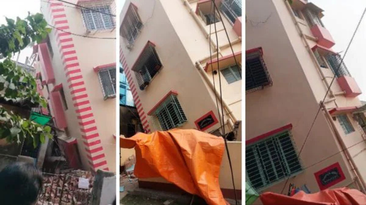 কলকাতার বুকে ঝুঁকে পড়া ভবন