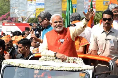 Narendra_Modi_650_Vadodara_roadshow_AFP.webp