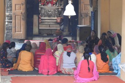 Women_devotees_reciting_prayer_at_Laxminarayan_temple_Chamba._05-scaled-e1754022971560.jpg