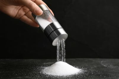 closeup_hand_salt_shaker_1374938821.jpg