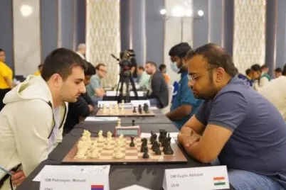 delhi-gm-open-nikitenko-downs-paichadze-catches-abhijeet-gupta-at-summit-in-round-8-thriller-mdl.webp